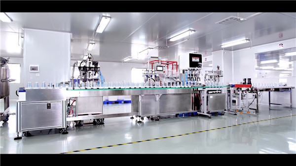 Automatische Cremefüll- und Verschließmaschine